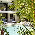 \'The Palms\' Swim-Out Comfort Meets Tropical Charm