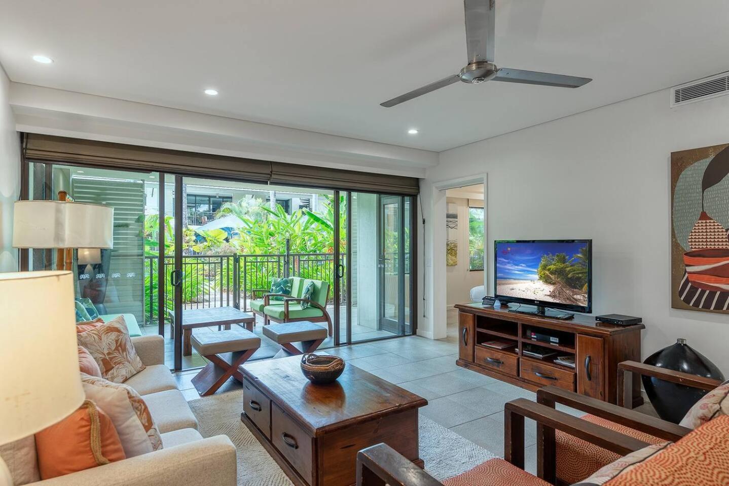 Poolside At Temple - A Lush Tropical Escape Port Douglas